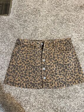 Leopard Print Button-Front Mini Skirt in Brown